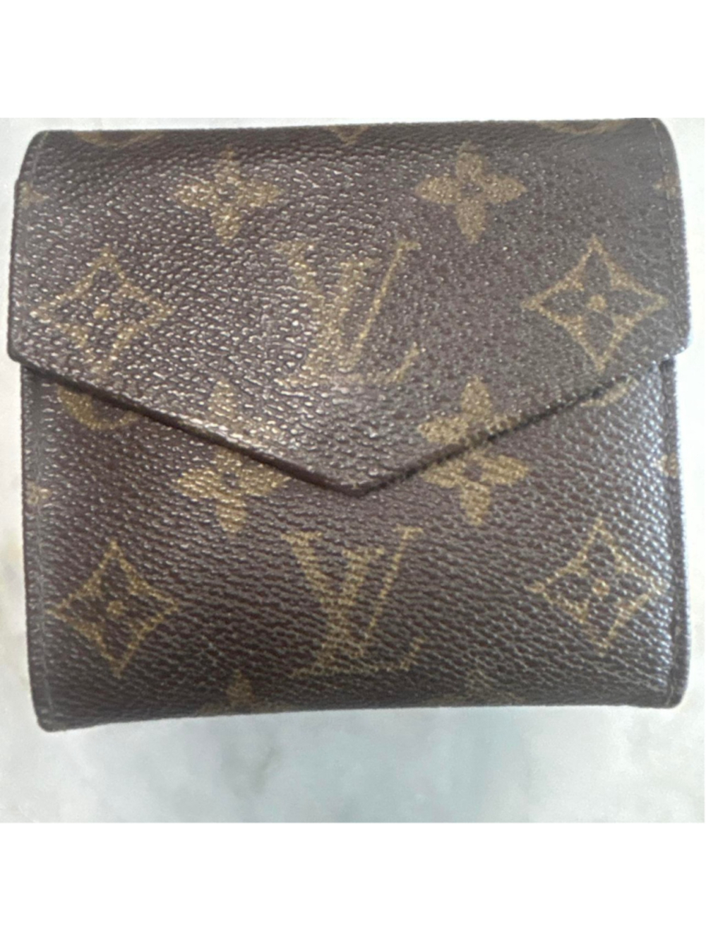 Preowned Classic Louis Vuitton monogram wallet with gold accents